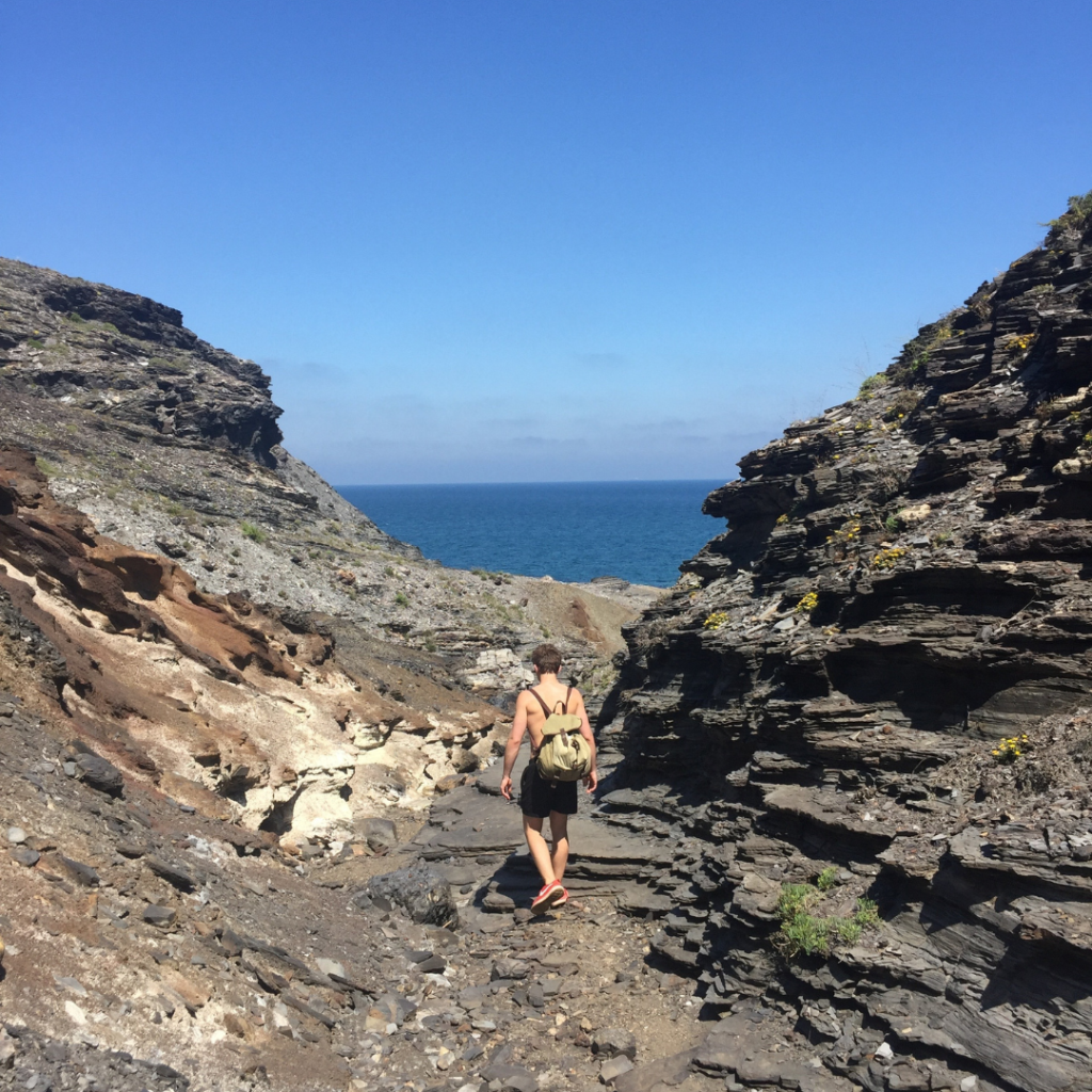 a person walking on a rocky path